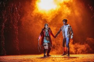 The Ocean at the End of the Lane – Millie Hikasa as Lettie and Keir Ogilvy as Boy – Credit Brinkhoff-Moegenburg