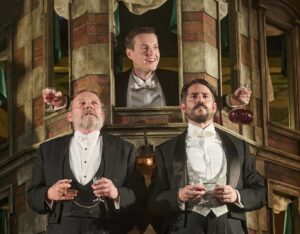 An Inspector Calls – Jeffrey Harmer (Mr Birling), George Rowlands (Eric Birling), Simon Cotton (Gerald Croft) – Photo by Mark Douet