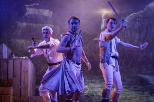 The Pirates of Penzance – Robert Wilkes as Ruth, Tom Newland as Pirate King, Cameron McAllister as Frederick – Credit Mark Senior