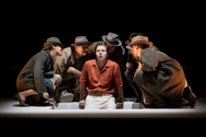 Ed McVey (centre) as Tom Ripley & the cast in THE TALENTED MR RIPLEY, credit Mark Senior 1