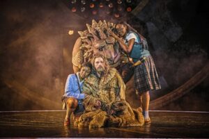 Kudzai Mangombe (Lucy) Stanton Wright (Aslan ) Joanna Adaran (Susan). Photo by Brinkhoff-Moegenburg